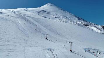Above Cable Car at Osorno Vulcan Puerto Montt in Chile. Snow Background Mountains. video