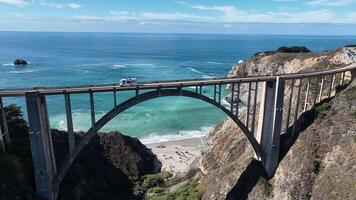 Aerial Bixby Creek Bridge in Highway 1 California in United States. Blue Sky Bay. video