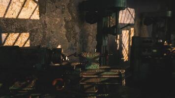 Old workshop with machinery illuminated by sunset light video