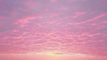 Pink and purple sunrise sky with clouds. photo