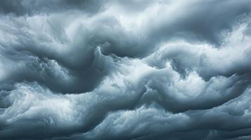 Dramatic, swirling storm clouds fill the frame, showcasing texture and movement. photo