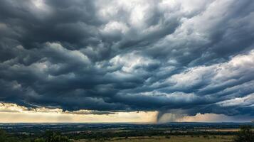 Dramatic storm clouds over a flat landscape. photo