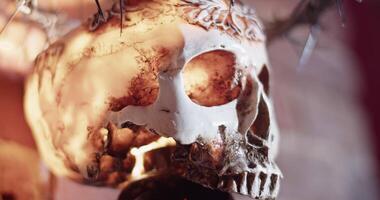 Lightning strikes on illuminated skull at home video