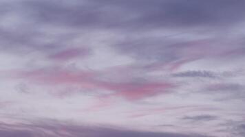 Sunset sky with clouds floating over green forest trees video