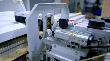Automated machine in workshop. Manufacturing of doors. Work of modern instrument. Making furniture. Close-up. video