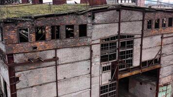 Abandoned building during war time. Destroyed building with broken windows. Exterior of ruined architecture. video