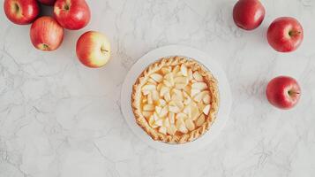 Apple pie on marble counter top photo