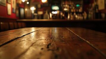 A wooden table in a dimly lit bar photo