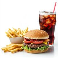 A hamburger and fries with a soda on a white background photo