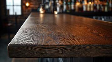 A bar counter with a wooden top photo
