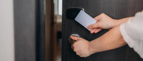 Smart card key to lock and unlock door. Security systems and protection concept. photo