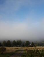 Fog forming in the morning in Varmland, Sweden. photo