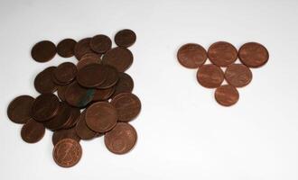 Heaps of Euro cents, clean and dirty. photo
