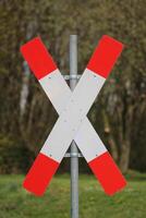 Railway crossing sign in Germany. photo