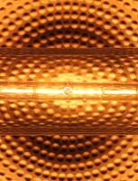 Halogen tube lamp with a reflecting background. photo