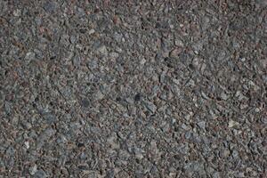 Asphalt texture from the street, dark gray. photo