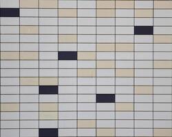 Tiled metalplastic sheet texture with different colors. photo