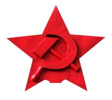 Red star with hammer and sickle, isolated on white. photo