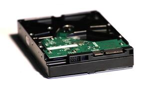 Hard disk on a white background photo