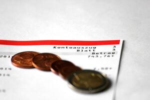 Abstract of account with some Euro coins. photo