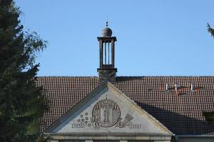 Logo on a building of the university of Greifswald, Mecklenburg-Vorpommern, Germany photo