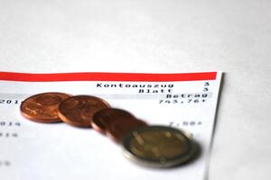 Abstract of account with some Euro coins photo