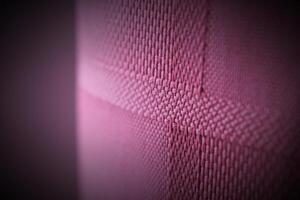 Light red Curtain with soft contours usable as background. Vignetting was applied. photo