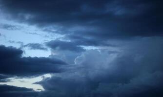 Heavy and dark clouds in the evening. photo
