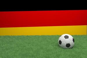 Realistic 3d rendering of a football in front of the flag of Germany. photo