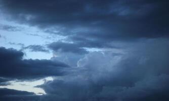 Heavy and dark clouds in the evening photo