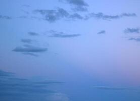 Evening cloudscape with a red tint photo