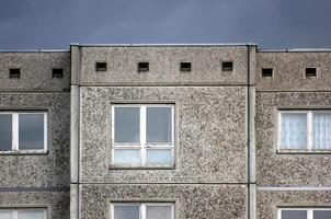 Part of a generic building reflecting the architectural style which was common in the German Democratic Republic photo