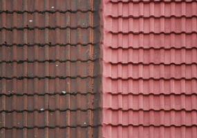 Old and new roof tiles side by side. photo