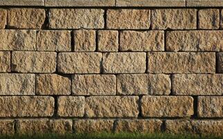 Wall made from freestones usable as background or texture. photo