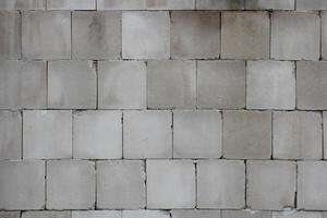 Wall made from concrete blocks usable as background or texture photo