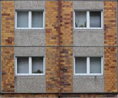 Typical windows in a plattenbau style building from eastern Germany. photo