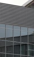 Reflections on modern building facade photo