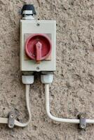 Old main power switch from the time of GDR. photo