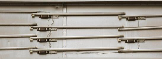 Old fluorescent tubes from an illuminated advertising. photo