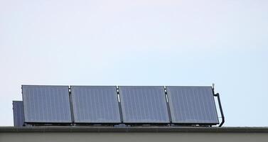 Small solar panel of roof of a building. photo