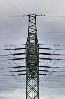 View to the side of a high voltage power line in Mecklenburg-Vorpommern, Germany. photo