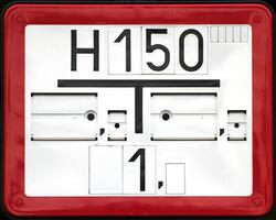 Fire hydrant sign in Germany. The top number tells the diameter of the pipe in millimeters, the lower one gives the position and distance of the underground hydrant from the sign. photo