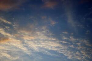 Different impressive and colorful clouds in the morning photo