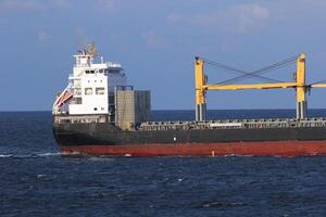 Freight ship in open water photo