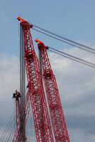 Red crane in a harbor. photo