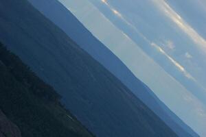 Different shades of blue seen from the mountain hastskar in Varmland, Sweden photo