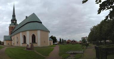 Panoramic view over church with church yard in Mora, Sweden photo