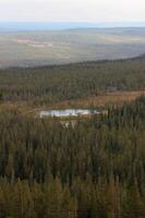 View over lake and entrance building of Fulufjaellet National Park. photo