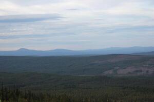 View on mountains from above the Njupeskr waterfalls in Fulufjllet National Park. photo