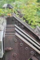 Old stopper at the end of a railtrack with defocusing effect. photo